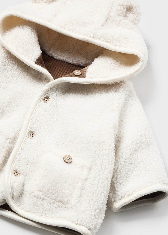 Reversible shearling coat