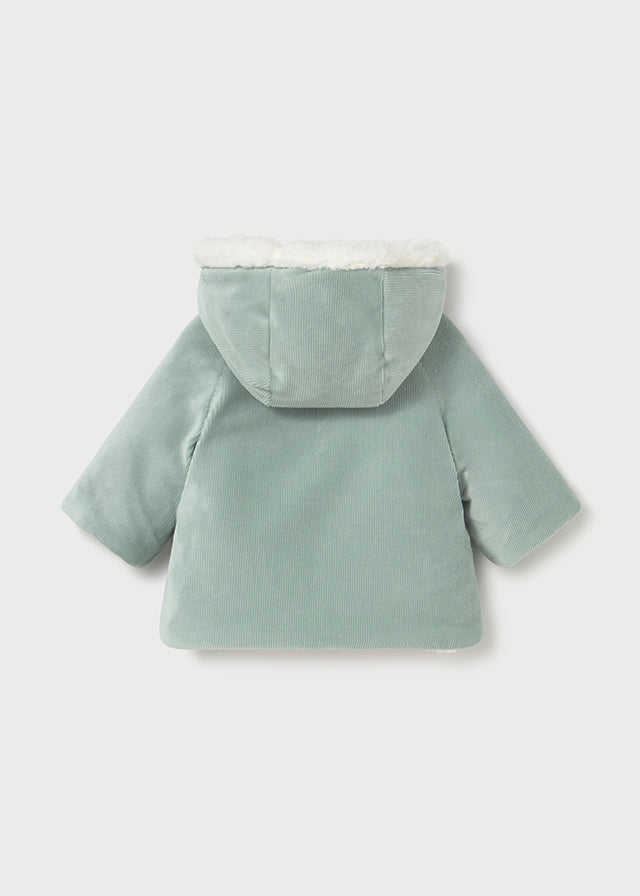 Reversible shearling coat