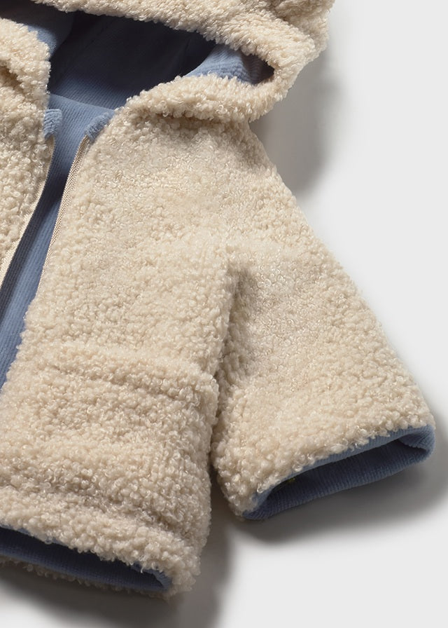 Reversible shearling coat